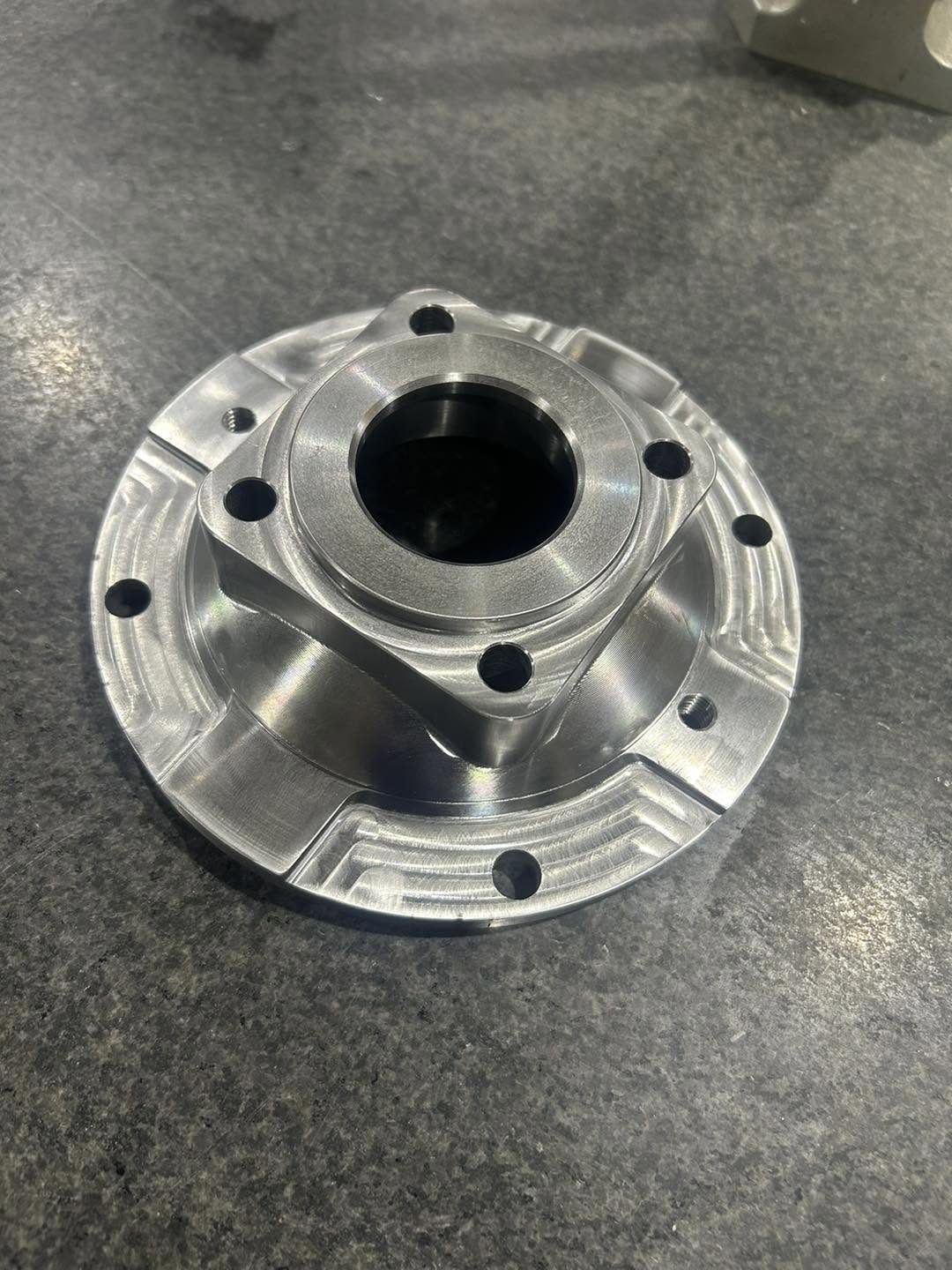 Machined aluminum flange component