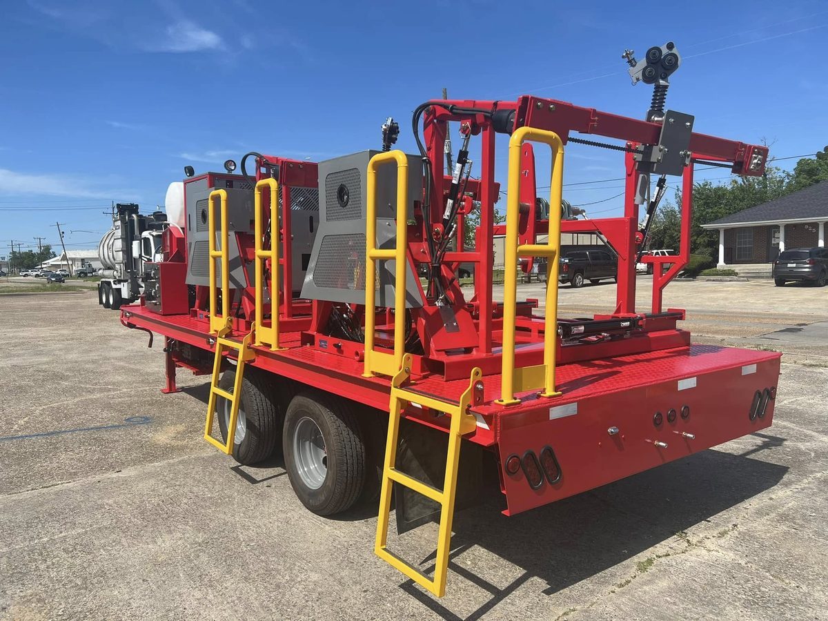 Custom-built red spooling trailer